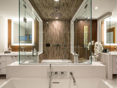 Astro Design Centre won in the category of custom bathroom, 101 sq. ft. or more, for a luxurious his and hers spa retreat with a double-entry glass shower designed by Nathan Kyle.