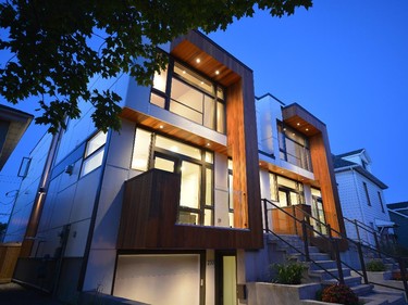 Ha2 Architecture Design won two awards for this pair of semi-detached homes defined by their two-storey overhang balconies clad in western red cedar. It won custom urban home, multi-unit, and the balcony design also won for exterior details.