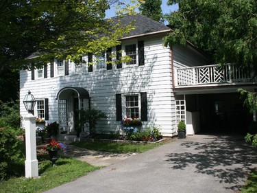 This Georgian Revival-style home was built by Commander Barry German in 1942 for his widowed daughter-in-law after the death of his son in the Second World War. German modelled the home after his own on the neighbouring property and it was designed by architects Cecil Burgess and E.A. Gardiner. It sits on a corner lot with old maple trees on what would have part of the original Keefer Estate. The home was recently renovated to open up the space and modernize the kitchen and bathrooms while retaining the historical integrity. Tour decorators: Stoneblossom Floral.
