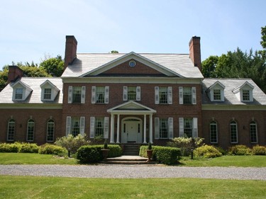 March Winds is a grand Georgian-inspired home named to reflect both it's location in old March Township and its constant breezes. The owners personally cleared their densely treed 2.5-acre property for their home, which features ample details such as decorative ceilings, trim, chair rails and panel moulding (made and installed by the owner). The living and dining rooms boast matching antique fireplace mantels while the living room is home to a working grandfather clock dating to the 1830s. The gardens have twice been featured on garden tours. Tour decorators: Trillium Floral.