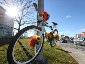 Ghost bike that pays tribute to Mario Theoret at Hunt Club and Merivale roads, Oct. 30, 2015.