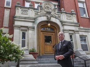John Booth, great-grandson of Ottawa lumber baron J.R. Booth, stands outside Booth House on Metcalfe Street, where he was conceived and briefly lived. The Booth family sold the house in 1947, after which it became the Laurentian Club.