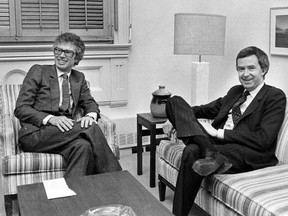 Ambassador Ken Taylor and Prime Minister Joe Clark meet for a private talk in Clark's office in Ottawa on Feb. 1, 1980. Former Canadian diplomat Taylor, who sheltered six U.S. citizens during the 1979 Iranian hostage crisis, has died.