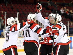 From left, Dante Salituro, Jeremiah Addison, Evan de Haan and Nevan Guy of the Ottawa 67's celebrate their first goal against Hamilton Bulldogs at TD Place on Friday, Oct. 2, 2015.