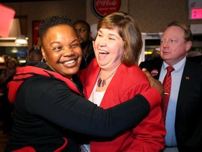 Liberal Anita Vandenbeld (right) celebrates her win in Ottawa-West Nepean with her family and supporters at Time Out Bar and Grill Monday night (Oct. 19, 2015).