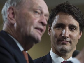 Liberal Leader Justin Trudeau and former prime minister Jean Chretien speak to the media in Hamilton, Ont., on September 13, 2015.