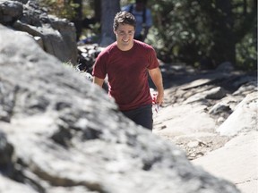 Liberal Leader Justin Trudeau climbs the famous Grouse Grind during an election campaign stop in North Vancouver, B.C., Friday, September 11, 2015.
