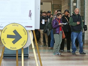 Lineup at the Ottawa City Hall voting station Ottawa, October 19, 2015. (Jean Levac/ Ottawa Citizen)
