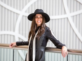 Fashion journalist and stylist Erica Wark is rocking the rebel look for fall and is wearing a Joe Fresh fedora and blouse and a dress from BCBGMAXAZRIA.