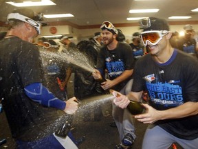 Members of the Toronto Blue Jays celebrate in Baltimore this week after clinching the American League East.