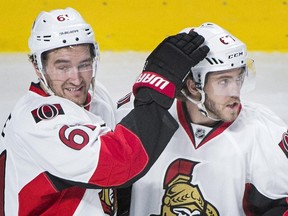 Ottawa Senators' Mike Hoffman, right, celebrates with teammate Mark Stone after scoring against the Montreal Canadiens during second period NHL pre-season hockey action in Montreal, Thursday, October 1, 2015.