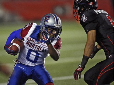 Montreal Alouettes' slotback Justin Caliste eluded the pursuit of Ottawa Redblacks' Antoine Pruneau, 6, during a kickoff return during the first half.