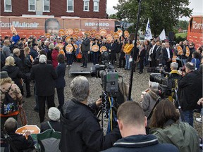 Federal NDP party leader Tom Mulcair speaks to supporters during his visit to Brantford-Brant riding NDP candidate Marc Laferriere's campaign office on Erie Avenue in Brantford, Ontario on Sunday.