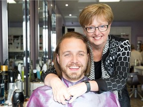 Ryan DeBruyn has a hair cut after growing it for over a year. DeBruyn grew his hair in an effort to raise money arter his mother, Nancy Schepers, was diagnosed.