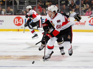 Mike Hoffman #68 of the Ottawa Senators moves the puck up ice during the first period.