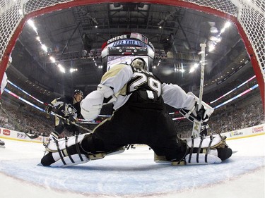 Marc-Andre Fleury #29 of the Pittsburgh Penguins protects the net in the first period.