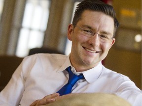 Pierre Poilievre, minister of employment and social development and minister of state for democratic reform, is photographed in his office in the center block of Parliament Hill Tuesday April 28, 2015.