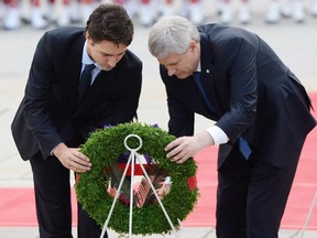 Prime Minister Stephen Harper and Justin Trudeau, prime minister-designate of Canada, place a wreath at the service.