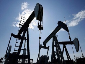 Pumpjacks at work pumping crude oil near Halkirk, Alta.