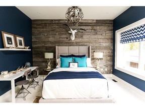 Sarah Baeumler chose a deep navy for son Quintyn's bedroom to reflect his personality.