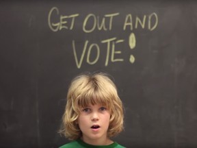 A screen grab from the video 'Get Out and Vote,' by Ottawa band Hey Buster and kids from Devonshire Public School.