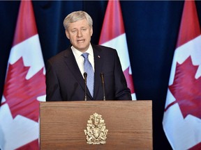 Prime Minister Stephen Harper speaks about the Trans-Pacific Partnership trade deal at a press conference in Ottawa on Monday, October 5, 2015.