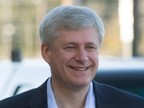 Conservative Leader Stephen Harper arrives at a polling station to cast his ballot in the federal election in Calgary, Alta., on Monday, October 19, 2015.