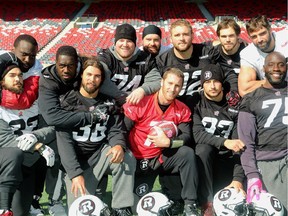 The 12 players who remain on the Ottawa Redblacks roster from the 2013 expansion include (from left): Jordan Verdone (33), J'Micheal Deane (64), Moton Hopkins (95), James Green (38), Keith Shologan (74), Matt Albright (53), Thomas DeMarco (17), Zack Evans (92), Justin Capicciotti (93), Andrew Marshall (90), Patrick Lavoie (81) and Jonathan Williams (75) Ottawa Redblacks practice at TD Place Thursday, October 29, 2015.