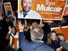 NDP Leader Tom Mulcair greets supporters as he arrives for the final leaders debate in Montreal Que., on Friday, October 2, 2015.