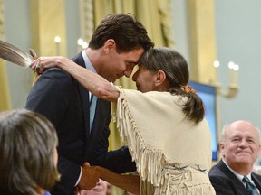Liberal Leader Justin Trudeau hugs Elder Evelyn Commanda-Dewache, a residential school survivor, during the closing ceremony of the Indian Residential Schools Truth and Reconciliation Commission, at Rideau Hall on  June 3.