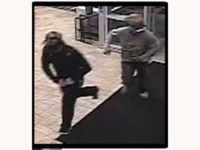 The Ottawa Police Service is looking for these two suspects in an armed robbery at a furniture store on Heron Road.