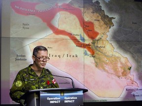 Lt.-Gen. Jonathan Vance, then-Commander of Canadian Joint Operation Command, holds a technical briefing on combat strikes against the Islamic State at National Defence Headquarters last fall.