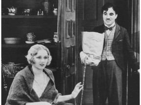 Virginia Cherrill and Charlie Chaplin in a scene from City Lights.