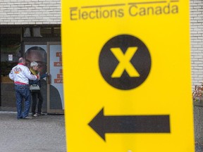 Voters head into St. Paul University to cast their ballots as hundreds of advance polls for the October 19 federal election open for four days including Thanksgiving Monday.