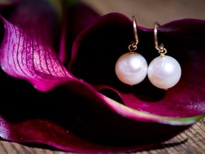 Simple yet elegant pearl earrings by Anne Sportun, $235, are sure to add a festive touch to any holiday outfit.