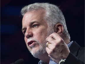 Quebec Premier Philippe Couillard speaks to delegates during the Quebec Liberal Party convention in Montreal, Sunday, June 14, 2015. THE CANADIAN PRESS/Graham Hughes