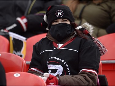 An Ottawa Redblacks fan looks on ahead of first half action in the CFL East Division final in Ottawa on Sunday, November 22, 2015.