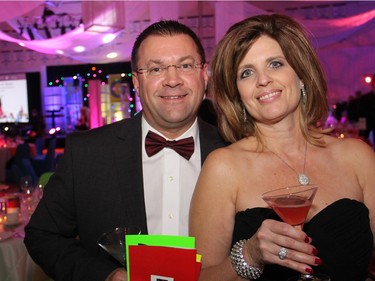Ashbury College parents Mike Way and his wife, Laurence Way, at the Ashbury Ball, which transformed the school gymnasium into a colourful party palace for this year's gala for the Rockcliffe Park private school, held Saturday, November 7, 2015.