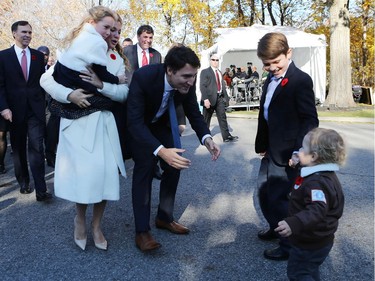 Incoming Canadian Prime Minister Justin Trudeau and his wife Sophie Gregoire and their children daughter Ella Grace and sons Hadrien (R) and Xavier, arrive with his cabinet before his swearing-in ceremony at Rideau Hall in Ottawa November 4, 2015.