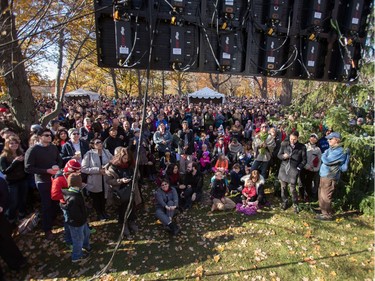 People gather to watch on big screens outside Rideau Hall as Canadian Prime Minister Justin Trudeau is sworn in as the 23rd Prime Minister in Ottawa, Ontario, November 4, 2015.