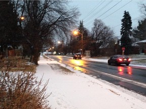 City streets were greasy Tuesday following the city's first serious flurries of the season.