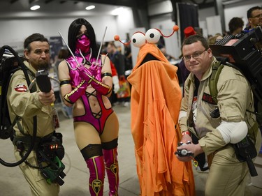 Cosplayers pose for a photo at Pop Expo.