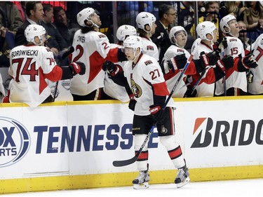 Ottawa Senators right wing Curtis Lazar (27) celebrates with teammates after scoring a goal against the Nashville Predators during the second period of an NHL hockey game Tuesday, Nov. 10, 2015, in Nashville, Tenn.