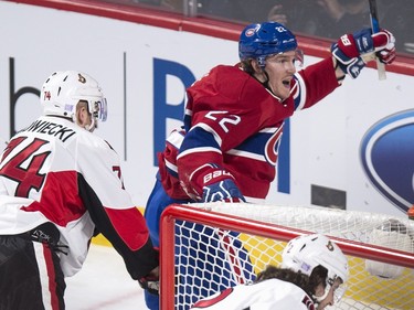 Montreal Canadiens' Dale Weise, right, celebrates his power play goal against the Ottawa Senators during second period NHL action.