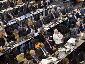 Delegates attend the opening of the Intergovernmental Panel on Climate Change (IPCC) at the Tivoli Congress Center in Copenhagen on October 27, 2014.