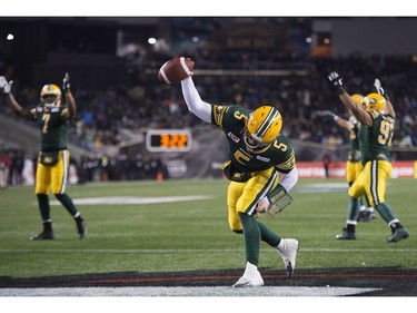 Edmonton Eskimos' quarterback Jordan Lynch scores a touchdown during the second half of the 103rd Grey Cup against the Ottawa Redblacks in Winnipeg, Man. Sunday, Nov. 29, 2015.