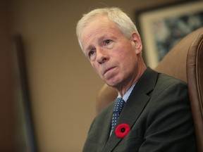 Foreign Affairs Minister Stephane Dion talks with the Ottawa Citizen's Lee Berthiaume in his office Wednesday November 11, 2015.