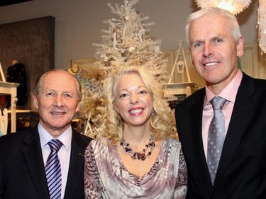 From left, Bernie Blais, retiring president and CEO of Bruyère with Bruyère Foundation president Peggy Taillon and incoming Bruyère president and CEO Daniel Levac at a Fashion FUNraiser held at Shepherd's women's clothing boutique in the Train Yards shopping district, on Monday, November 23, 2015. (