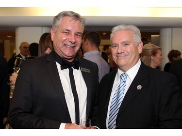 From left, Christie Lake Kids executive director Jeff Burry with the non-profit organization's board chair, Chris Hughes, at An Unlikely Pairing: Adventures in Food Trucks and Fine Wines, held in support of Christie Lake Kids on Thursday, November 12, 2015, at Ashbury College in Rockcliffe Park. (Caroline Phillips / Ottawa Citizen)