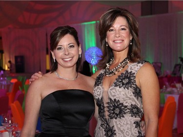 From left, Cindy Tomlinson-Keon and Kristine McGinn co-chaired this year's Fifteen Minutes of Fame-themed Ashbury Ball, held at Ashbury College, a private school in Rockcliffe Park, on Saturday, November 7, 2015.